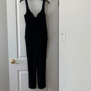 Black Express Jumpsuit, worn once, has pockets, Size 6